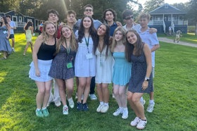 Group of people celebrating on stage