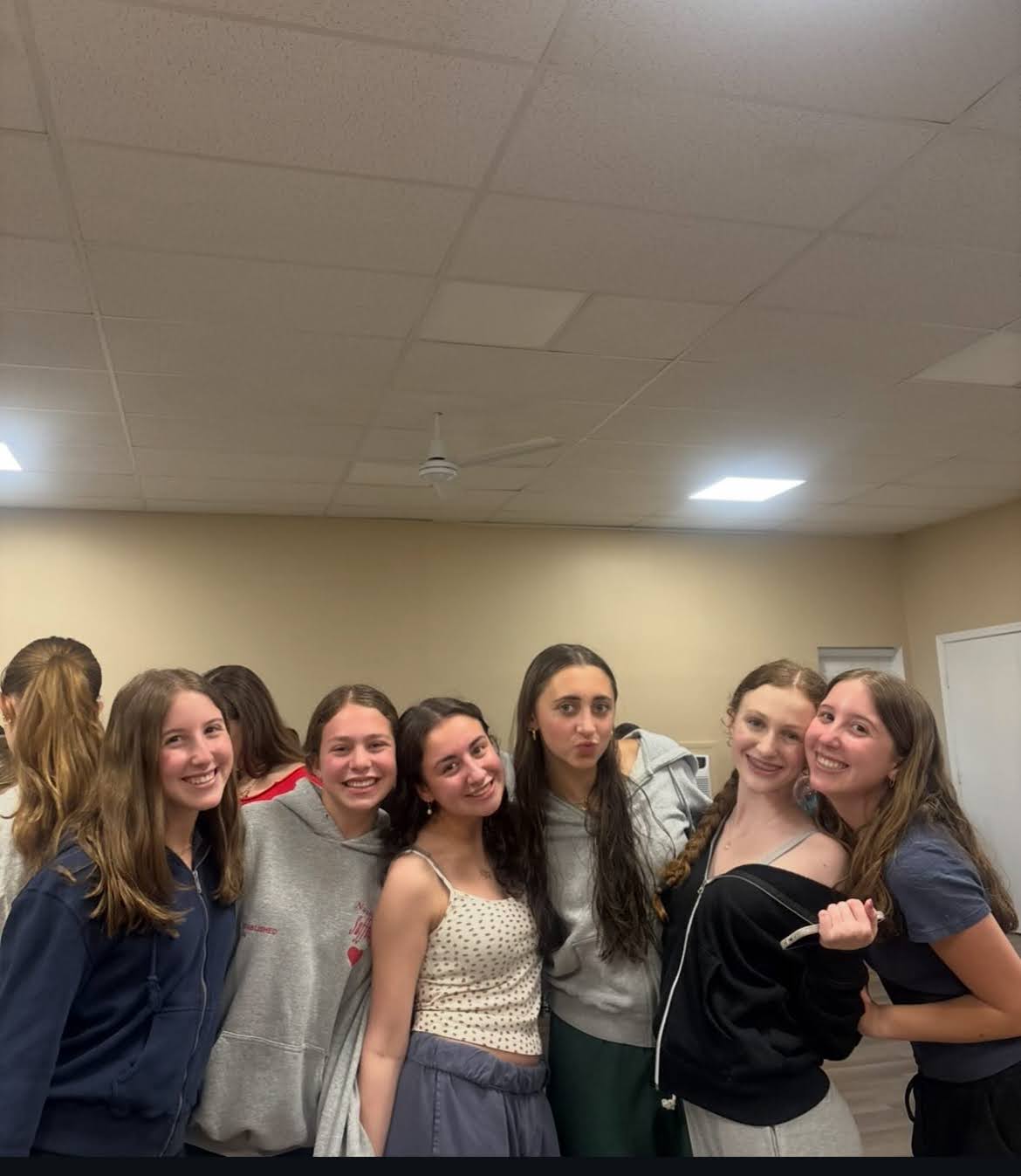 Group of people celebrating on stage