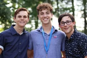 Group of people celebrating on stage