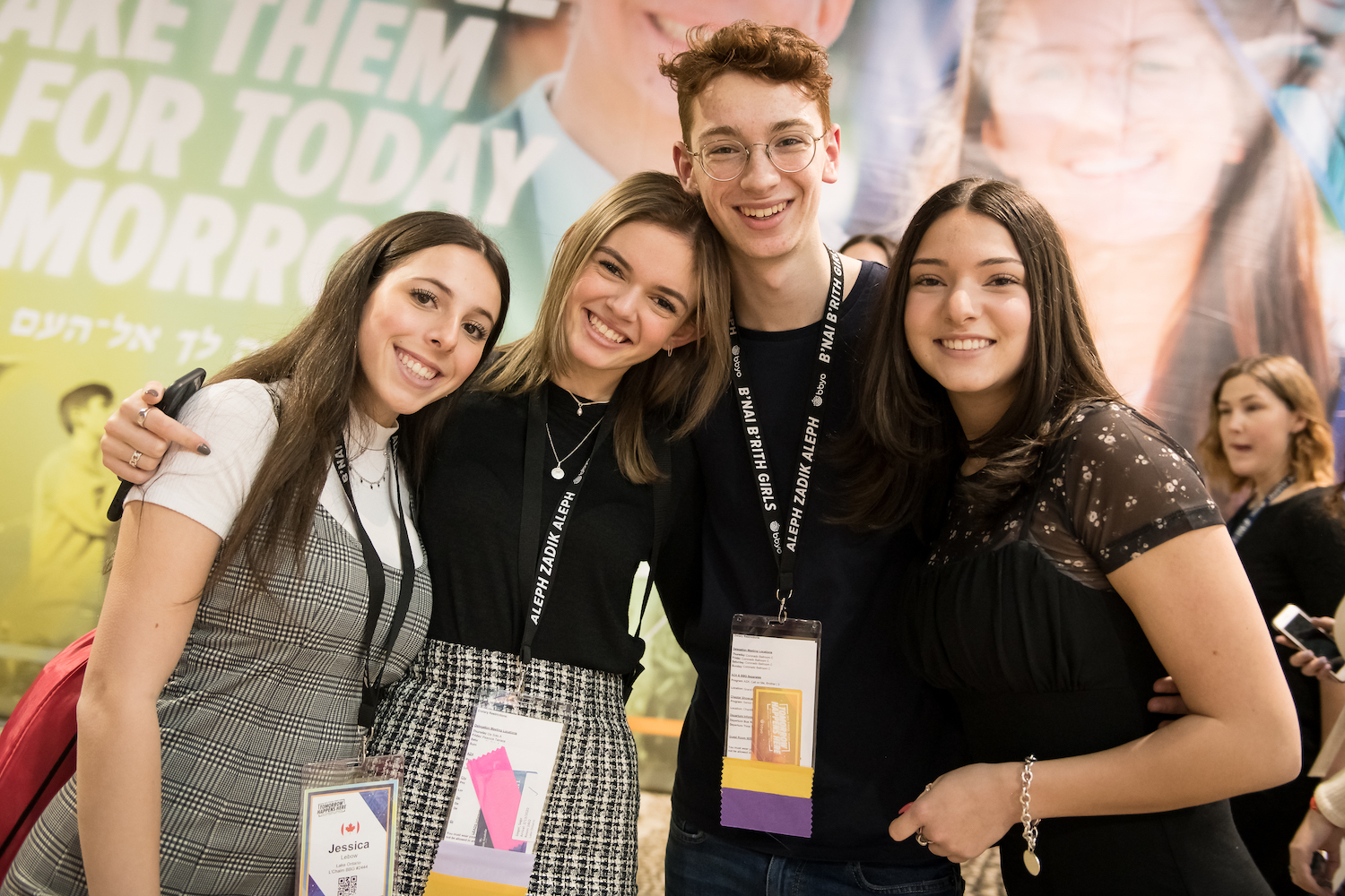 Group of diverse young people smiling at a community event