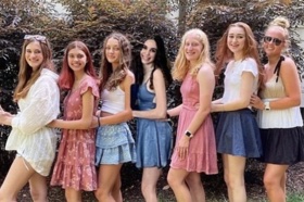 Group of people celebrating on stage