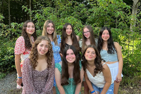 Group of people celebrating on stage