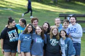 Group of people celebrating on stage