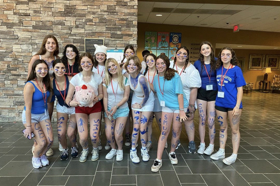 Group of people celebrating on stage