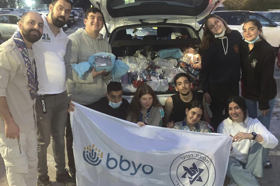 Group of people celebrating on stage