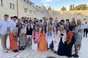 Group of people celebrating on stage