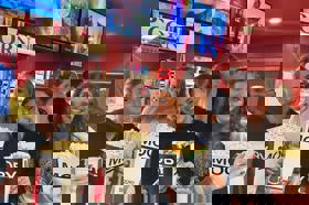 Group of people celebrating on stage