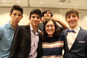 Group of people celebrating on stage