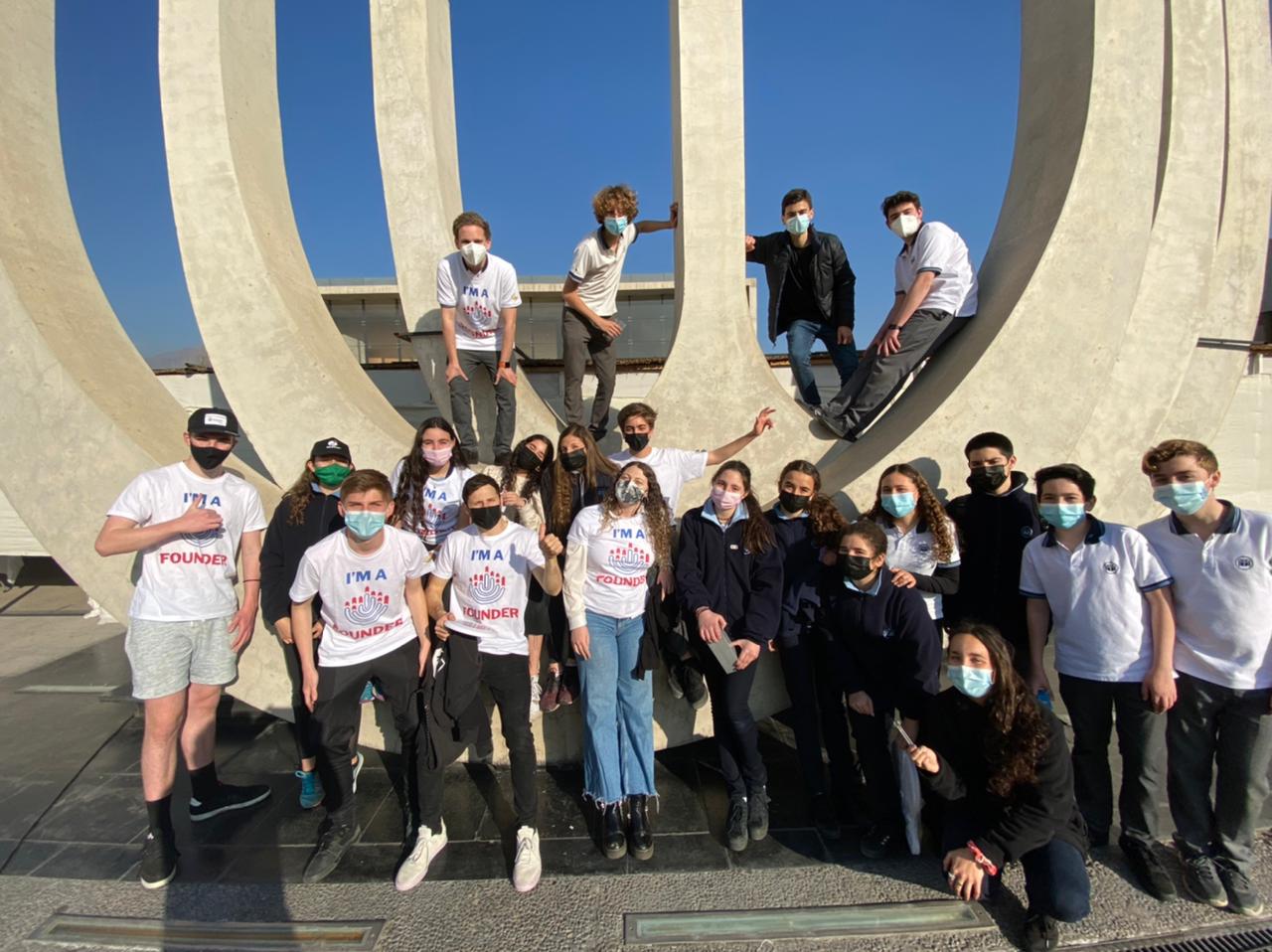 Group of people celebrating on stage