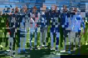 Group of people celebrating on stage