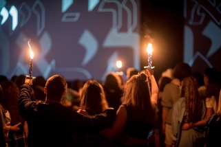 Group of people celebrating on stage