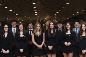 Group of people celebrating on stage