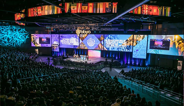 Group of people celebrating on stage