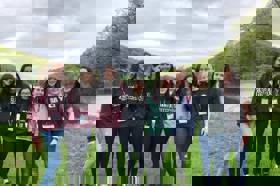 Group of people celebrating on stage