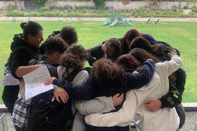 Group of people celebrating on stage