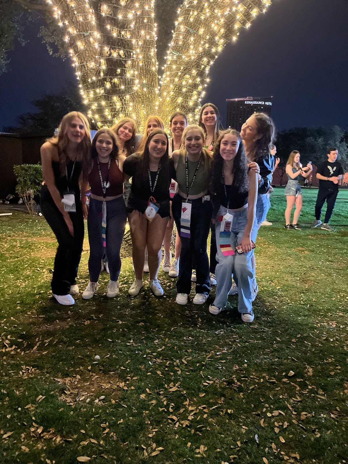 Group of people celebrating on stage