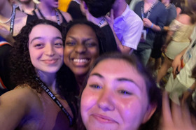 Group of people celebrating on stage