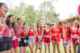 Group of people celebrating on stage