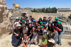Group of people celebrating on stage