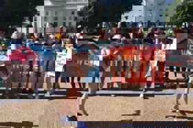 Group of people celebrating on stage