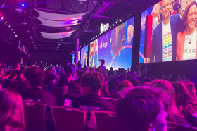 Group of people celebrating on stage