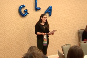 Group of people celebrating on stage