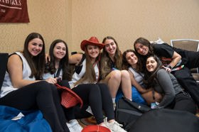 Group of people celebrating on stage