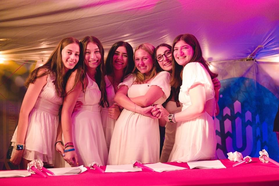 Group of people celebrating on stage