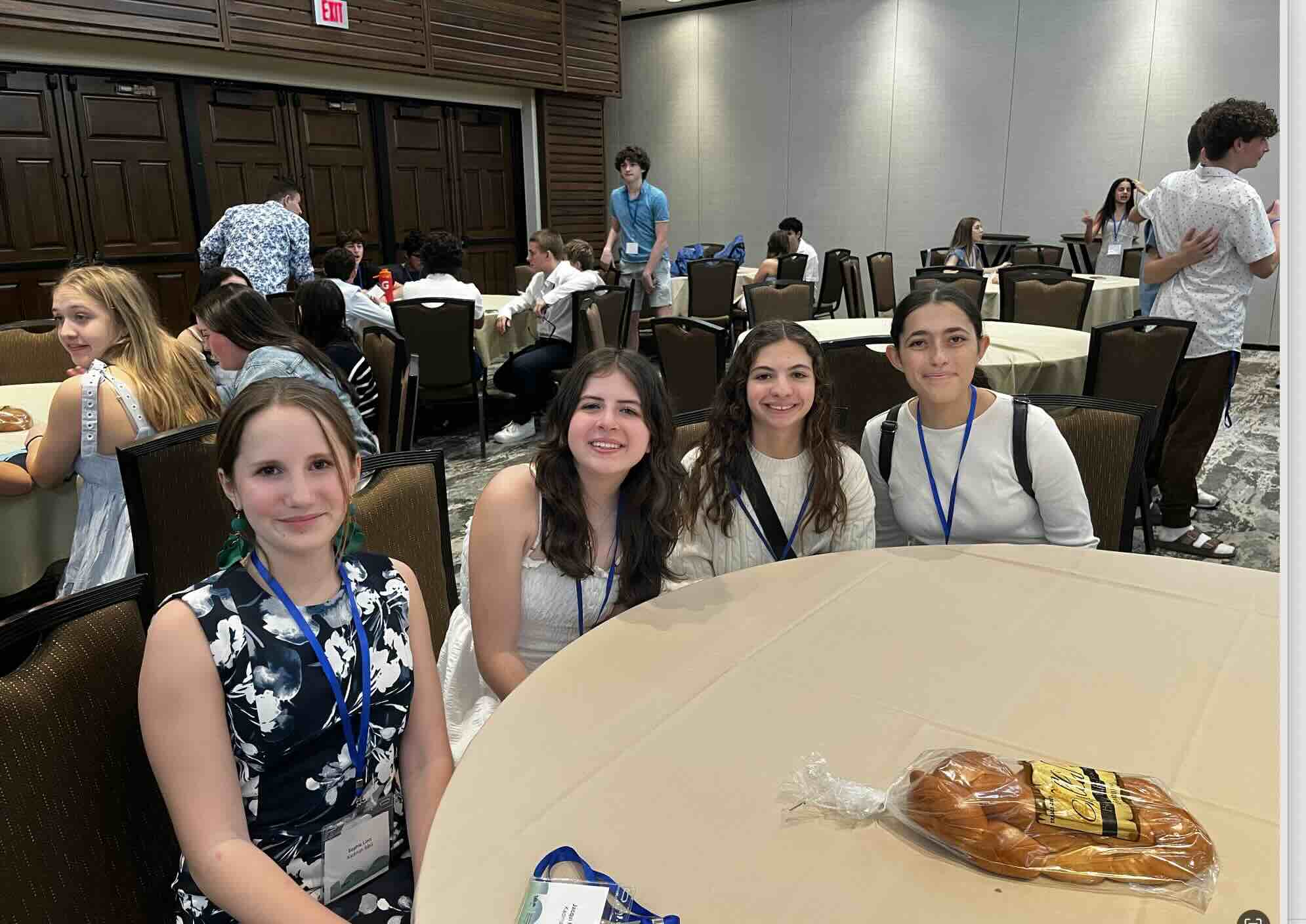 Group of people celebrating on stage