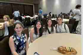 Group of people celebrating on stage